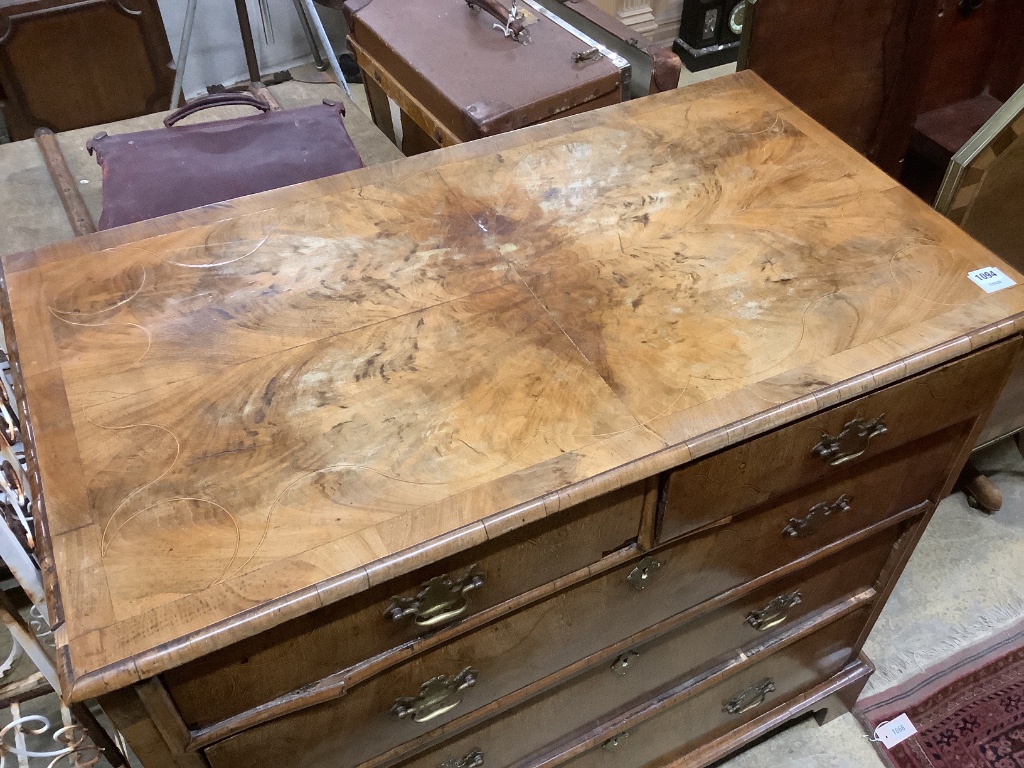 A William and Mary walnut and oak inlaid chest, in two parts, width 101cm, depth 56cm, height 97cm